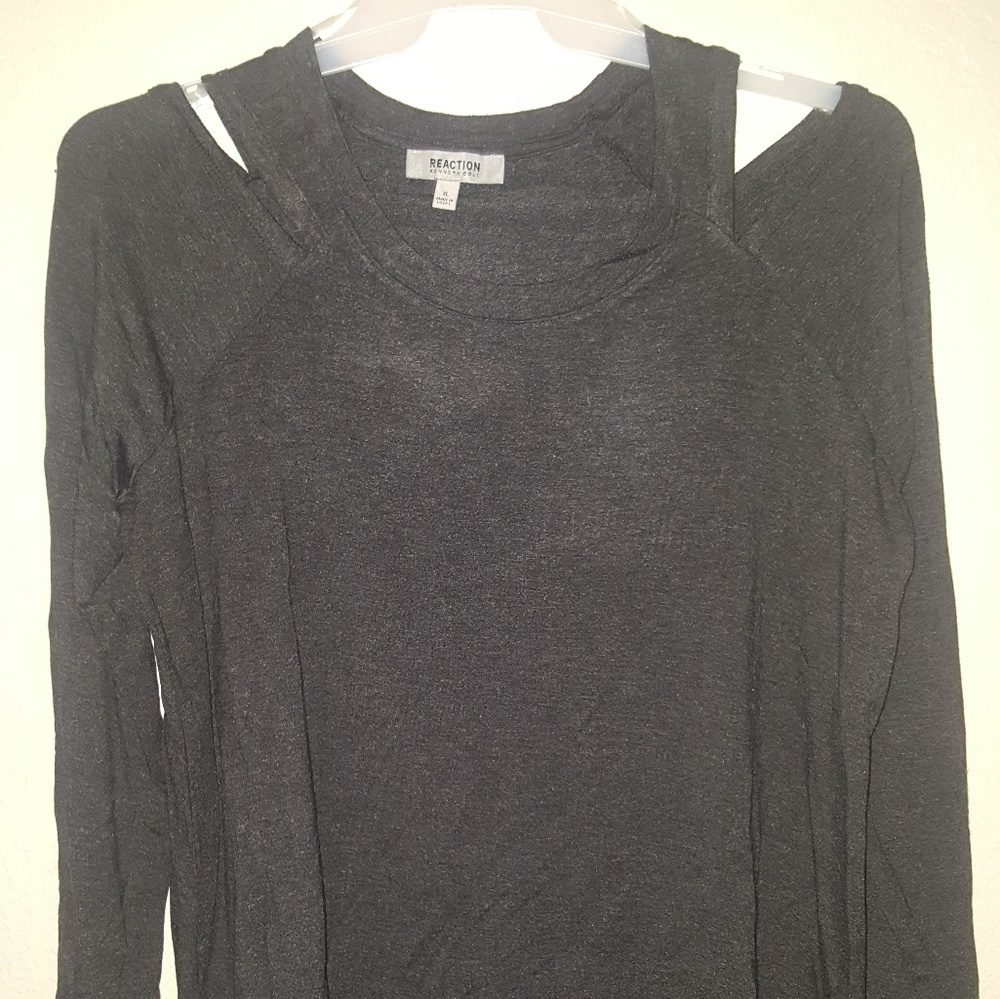 New without tags long sleeve cutout top.